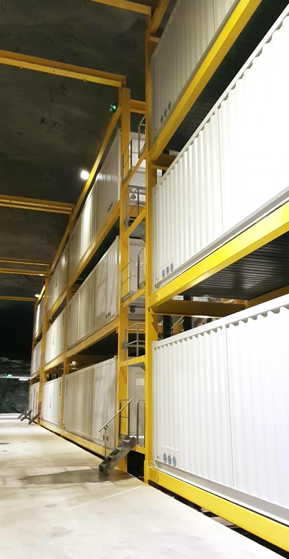 The mining containers are stacked three high in the bowels of the Lefdal mine (Lefdal Mine Datacentre)