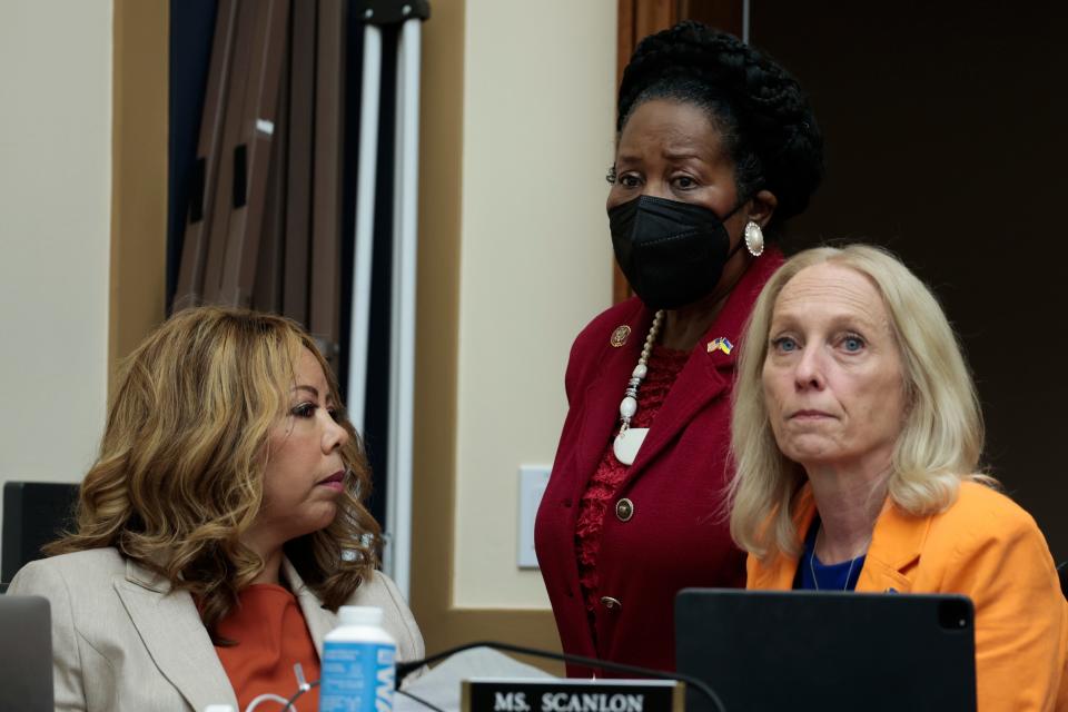 WASHINGTON, DC - JUNE 02: (L-R) Rep. Lucy McBath (D-GA) speaks with Rep. Sheila Jackson Lee (D-TX) and Rep. Mary Gay Scanlon (D-PA) during a House Judiciary Committee hearing in the Rayburn House Office Building on June 02, 2022 in Washington, DC.