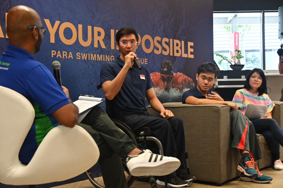 Para swimmer Toh Wei Soong during a panel discussion at the inaugural Para Swimming Dialogue. Other panellists include para swimmer Wong Zhi Wei (second from right) and Ferin Fu, mother of para swimmer Nicole Fu (right). (PHOTO: Singapore Disability Sports Council)