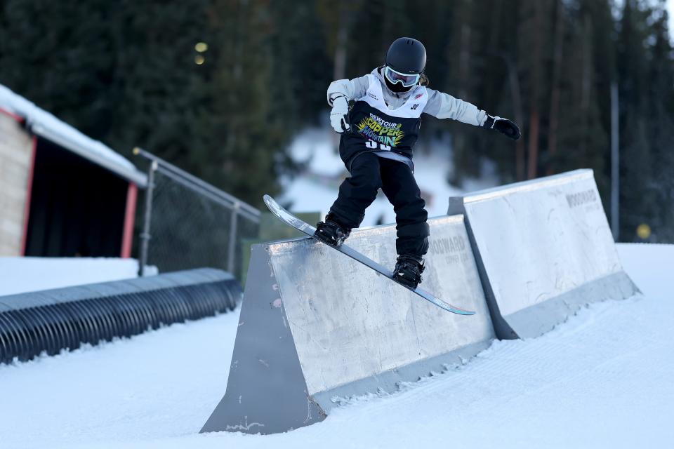 Patti Zhou competes during the women’s snowboard super streetstyle final during the Dew Tour event at Copper Mountain, Colorado.