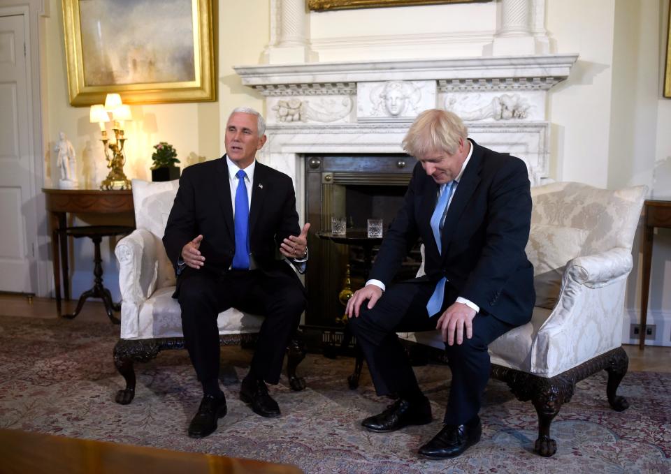 Vice President Mike Pence and British Prime Minister Boris Johnson in London on Thursday.