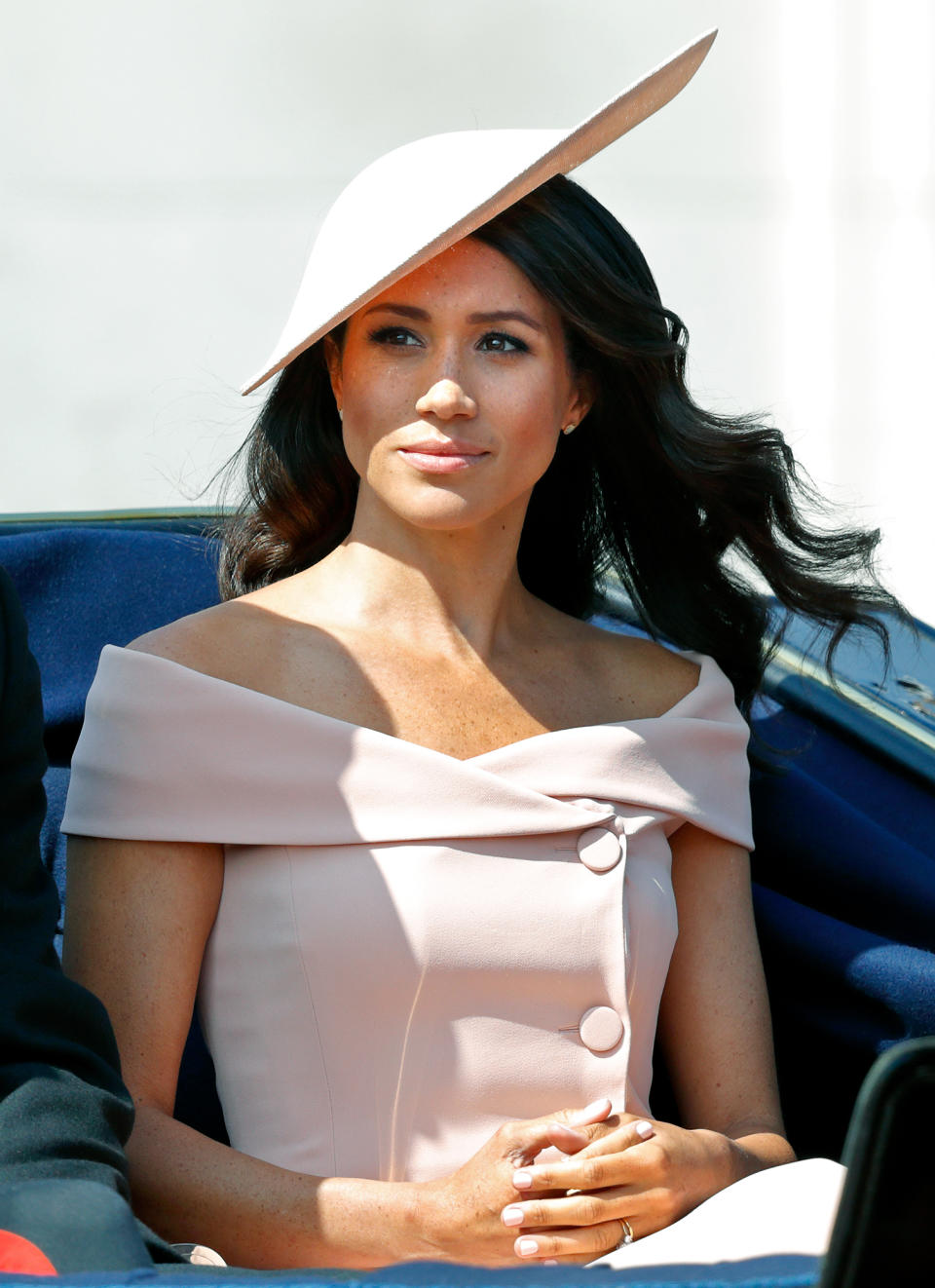 Meghan, Duchess of Sussex travels down The Mall in a horse drawn carriage during Trooping The Colour 2018 on June 9, 2018 in London, England. The annual ceremony involving over 1400 guardsmen and cavalry, is believed to have first been performed during the reign of King Charles II. The parade marks the official birthday of the Sovereign, even though the Queen's actual birthday is on April 21st.