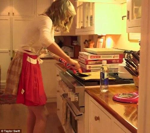 Taylor Swift cooking in her kitchen