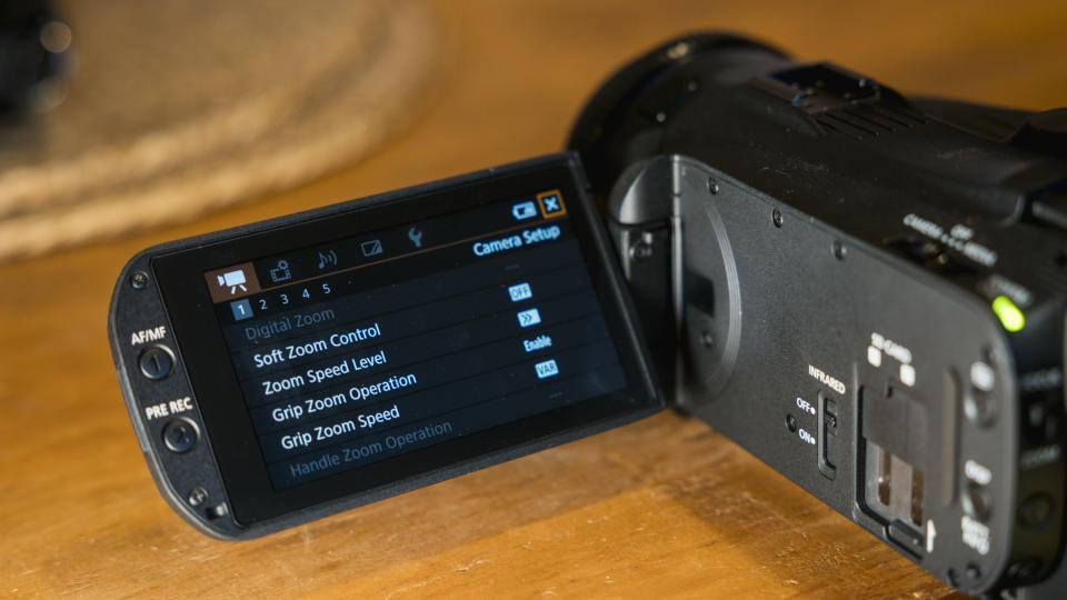 The Canon XA5 on a wooden table