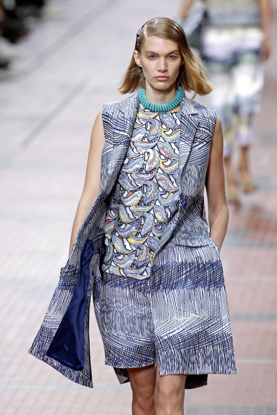 A model presents a creation as part of Kenzo's ready-to-wear Spring/Summer 2014 fashion collection, presented Sunday, Sept. 29, 2013 in Paris. (AP Photo/Thibault Camus)