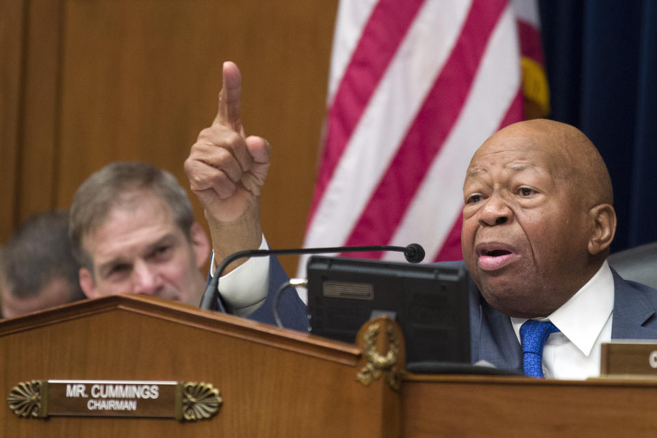 FILE - In this Wednesday, Feb. 27, 2019 file photo, House Oversight and Reform Committee Chair Elijah Cummings, D-Md., right, speaks as he gives closing remarks with Rep. Jim Jordan, R-Ohio, the ranking member, at left, as the hearing for Michael Cohen, President Donald Trump's former lawyer, at the House Oversight and Reform Committee concludes, on Capitol Hill, in Washington. Cummings, said afterward that he wanted to call in several people mentioned repeatedly by Cohen. (AP Photo/Alex Brandon, File)