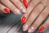 <p>Think of this design as jewelry for your nails! The striking red and pink combination is set off with glittery tips and silver bands that mimic rings. </p>