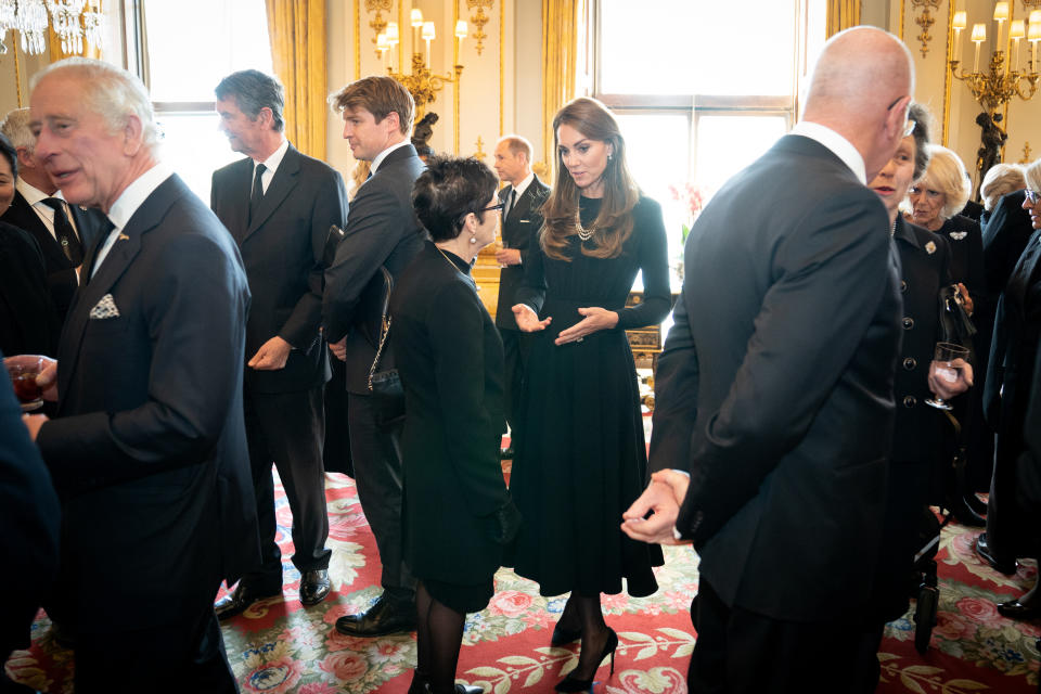 Catherine wore black to attend a lunch held for the Commonwealth nations at Buckingham Palace. (Getty Images)