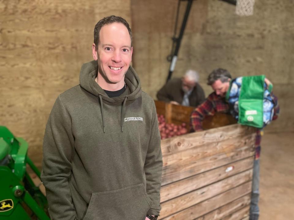 Adam Jay, a partner at G. Visser and Sons, says the Come Fill Your Boots event is a great way for the business to connect to the community and show Islanders what it's like to farm.