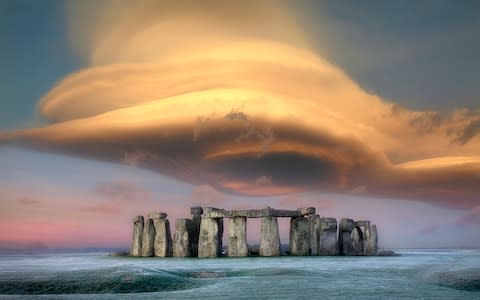 Stonehenge pulls in a crowd on the summer solstice - but looks majestic year-round - Credit: Getty