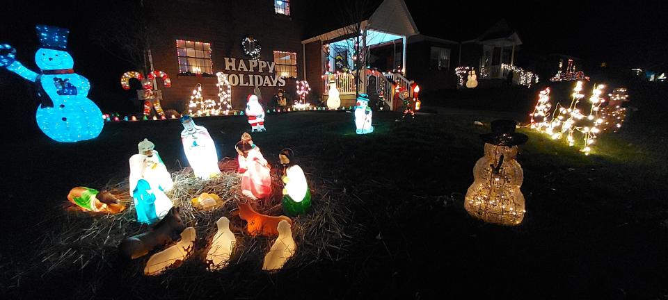 The decorated front yard of the Melfis on Patricia Drive in Ellwood City.