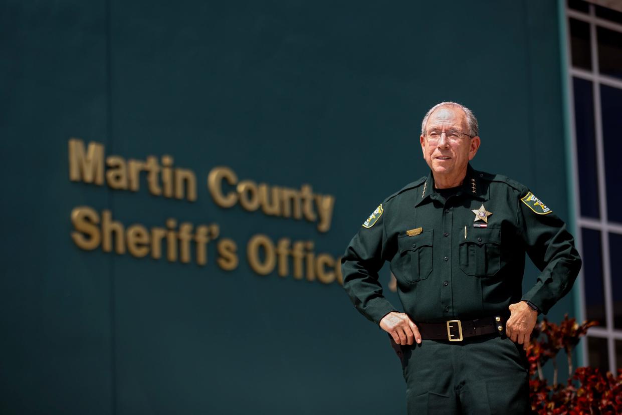 Martin County Sheriff William Snyder stands in front of the agency's main office for a portrait Tuesday, March 26, 2024, at 800 S.E. Monterey Rd. in Stuart. On March 6, Snyder, 71, announced he will not seek a fourth term as sheriff. Snyder endorsed Chief Deputy John Budensiek, a 27-year veteran of the office who has filed papers to run for sheriff.