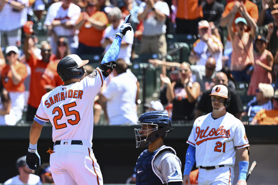 Baltimore Orioles' Anthony Santander (25) gestures after hitting a solo home run against Tampa Bay Rays starting pitcher Corey Kluber during the first inning of a baseball game, Sunday, June 19, 2022, in Baltimore. (AP Photo/Terrance Williams)