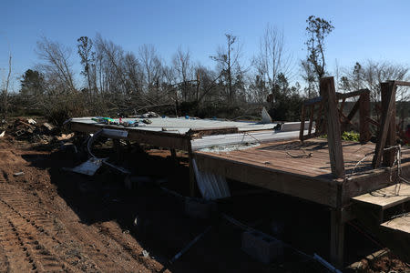 The remains of a home, where one person perished, sits destroyed after two deadly back-to-back tornadoes, in Beauregard, Alabama, U.S., March 6, 2019. REUTERS/Shannon Stapleton