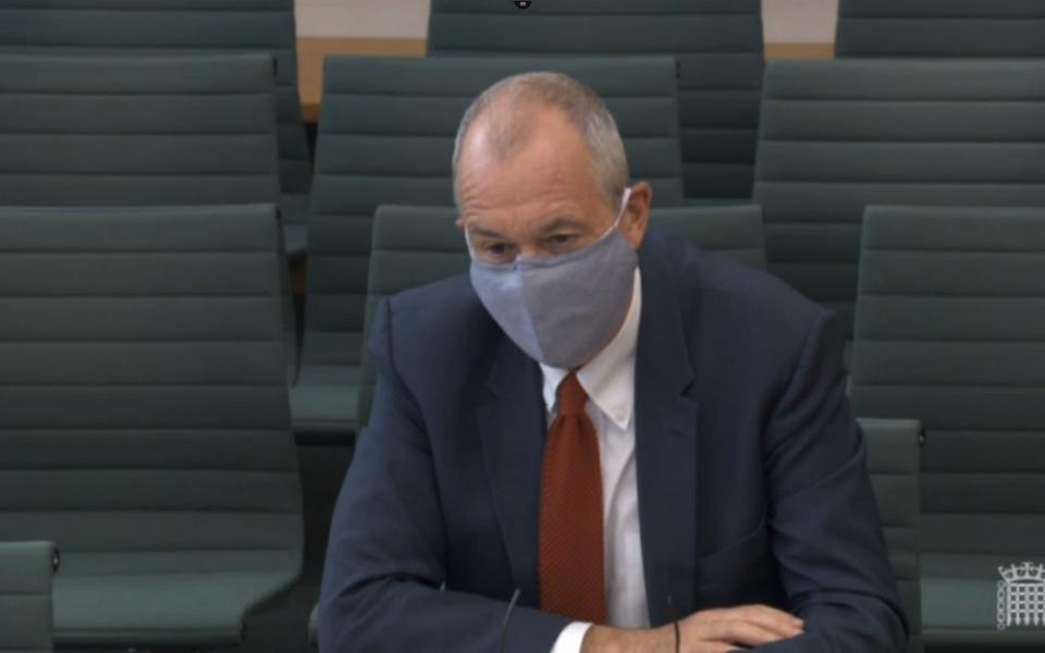 Sir Patrick Vallance appeared before MPs wearing a face mask back in July