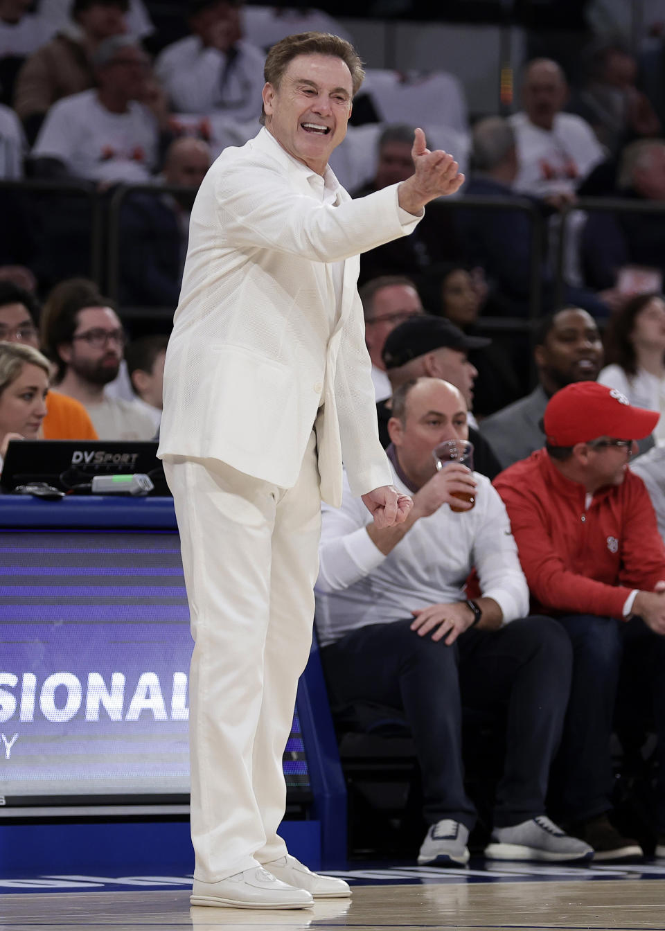 St. John's head coach Rick Pitino directs his team against Creighton during the first half of an NCAA college basketball game Sunday, Feb. 25, 2024, in New York. (AP Photo/Adam Hunger)