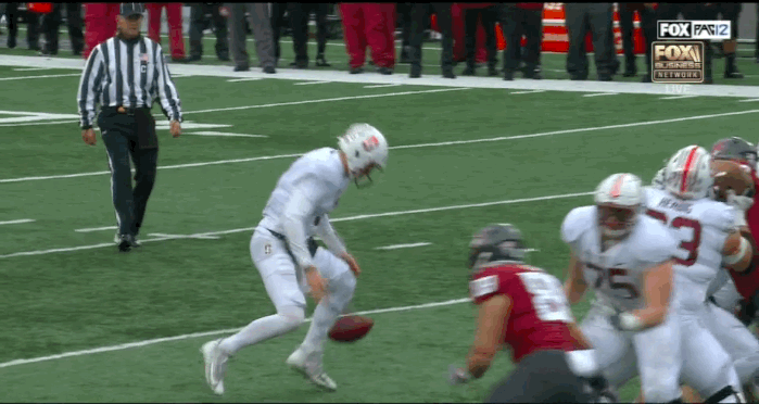 Stanford quarterback K.J. Costello dropped the ball, picked it up and ran in for a 22-yard touchdown. (FOX)