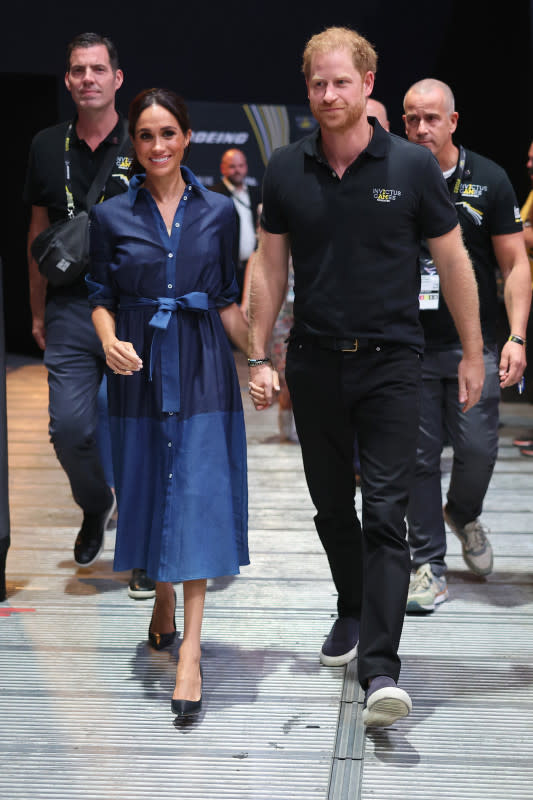 Meghan Markle and <span class="caas-xray-inline-tooltip"><span class="caas-xray-inline caas-xray-entity caas-xray-pill rapid-nonanchor-lt" data-entity-id="Prince_Harry,_Duke_of_Sussex" data-ylk="cid:Prince_Harry,_Duke_of_Sussex;pos:2;elmt:wiki;sec:pill-inline-entity;elm:pill-inline-text;itc:1;cat:Royalty;" tabindex="0" aria-haspopup="dialog"><a href="https://search.yahoo.com/search?p=Prince%20Harry,%20Duke%20of%20Sussex" data-i13n="cid:Prince_Harry,_Duke_of_Sussex;pos:2;elmt:wiki;sec:pill-inline-entity;elm:pill-inline-text;itc:1;cat:Royalty;" tabindex="-1" data-ylk="slk:Prince Harry;cid:Prince_Harry,_Duke_of_Sussex;pos:2;elmt:wiki;sec:pill-inline-entity;elm:pill-inline-text;itc:1;cat:Royalty;" class="link ">Prince Harry</a></span></span> at the 2023 Invictus Games in Düsseldorf, Germany.<p>Photo: Chris Jackson/Getty Images for the Invictus Games Foundation</p>