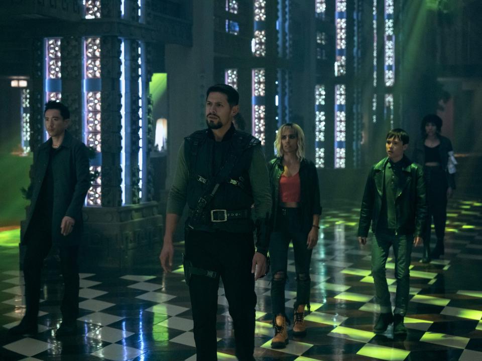 Justin H. Min as Ben Hargreeves, David Castañeda as Diego Hargreeves, Ritu Arya as Lila Pitts, Elliot Page as Viktor Hargreeves, and Emmy Raver-Lampman as Allison Hargreeves on season three, episode 10 of "The Umbrella Academy."