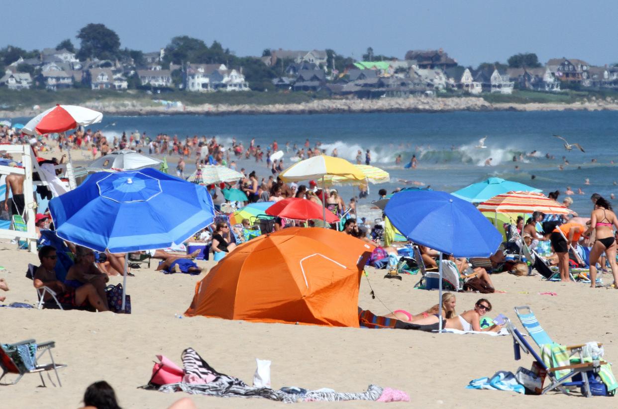 Crowds flock to Misquamicut State Beach in Westerly.