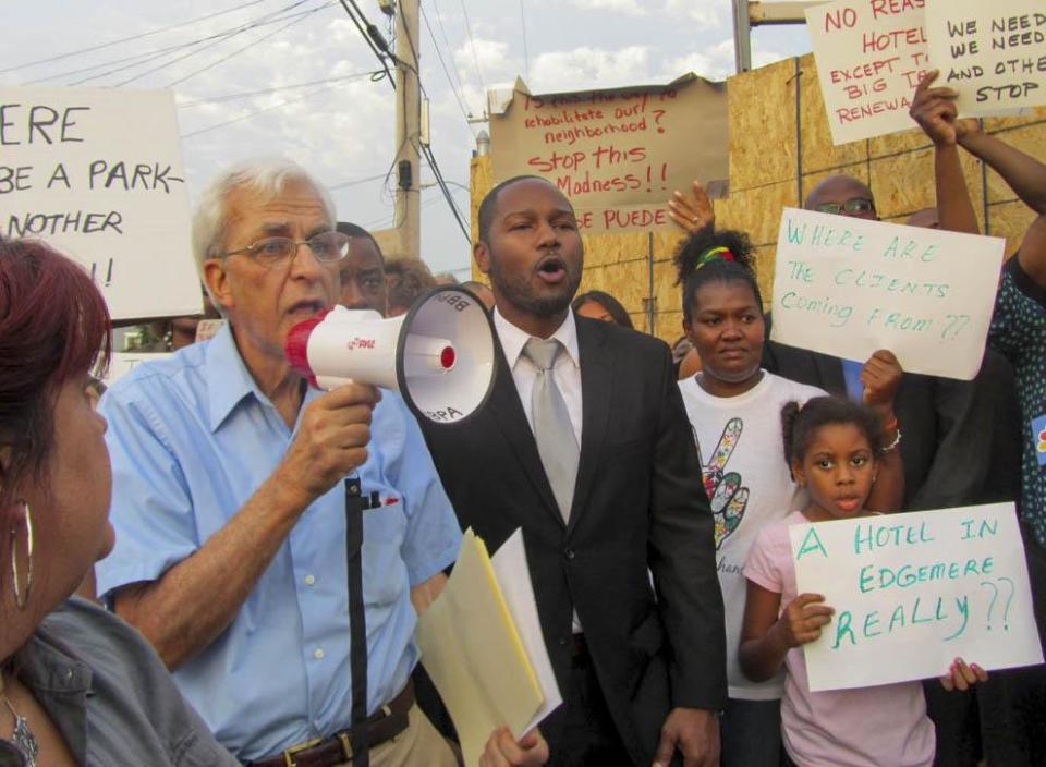 Stephen Cooper, left, leads a rally in Rockaway, N.Y., in 2012.