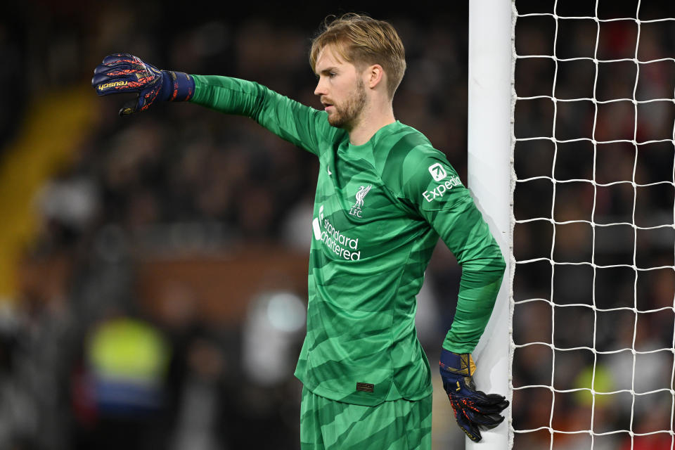 LONDON, ENGLAND - JANUARY 24: Caoimhin Kelleher of Liverpool lines up his wall during the Carabao Cup Semi Final Second Leg match between Fulham and Liverpool at Craven Cottage on January 24, 2024 in London, England. (Photo by Mike Hewitt/Getty Images)