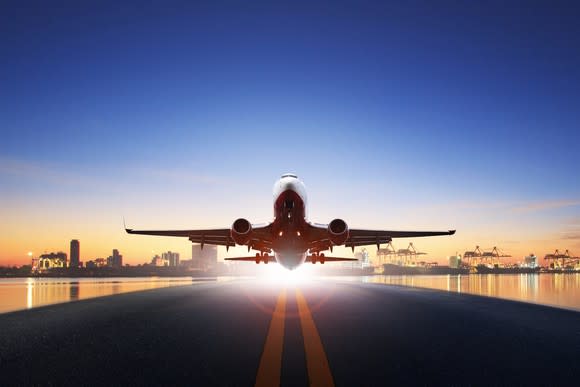 Cargo airplane taking off from runway