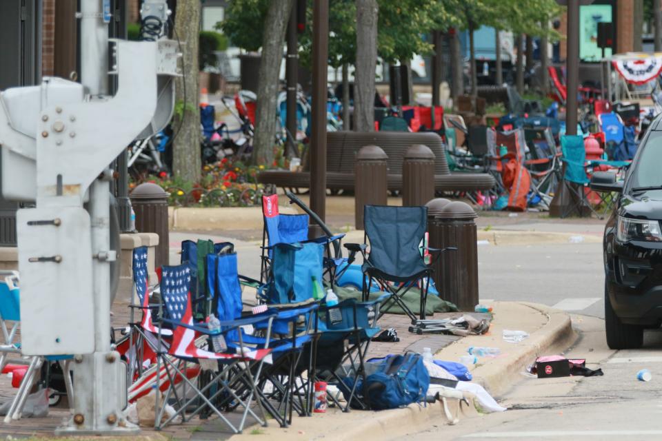 Belongings are shown left behind at the scene of a mass shooting along the route of a Fourth of July parade on 4 July 2022 in Highland Park, Illinois (Getty Images)