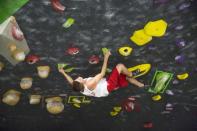 Drew Ruana, 16, a competitive climbing national champion, trains at Stone Gardens rock climbing gym in Bellevue, Washington October 20, 2015. REUTERS/Jason Redmond