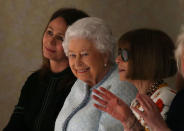 Caroline Rush (L), Chief Executive of the British Fashion Council, Britain's Queen Elizabeth II and Anna Wintour, Editor-in-Chief of Vogue attend the Richard Quinn show at London Fashion Week, in London, Britain February 20, 2018. REUTERS/Paul Hackett