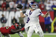 Tampa Bay Buccaneers inside linebacker Devin White (45) grabs ahold of New York Giants quarterback Daniel Jones (8) as he throws a pass during the second half of an NFL football game Monday, Nov. 22, 2021, in Tampa, Fla. (AP Photo/Mark LoMoglio)