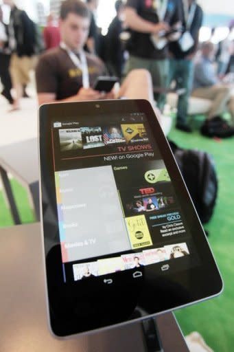 A Nexus 7 tablet is shown at the Google's developers conference on June 27. In addition to movie rentals, Google will be offering films for sale. The California-based Internet powerhouse boasted partnerships with major studios such as Disney, Paramount and Sony