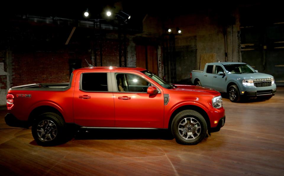 (L to R) The 2022 Ford Maverick Lariat FX4 (EcoBoost engine) and XLT Hybrid models shown off to the media at a studio in Detroit on Wednesday, June 2, 2021.