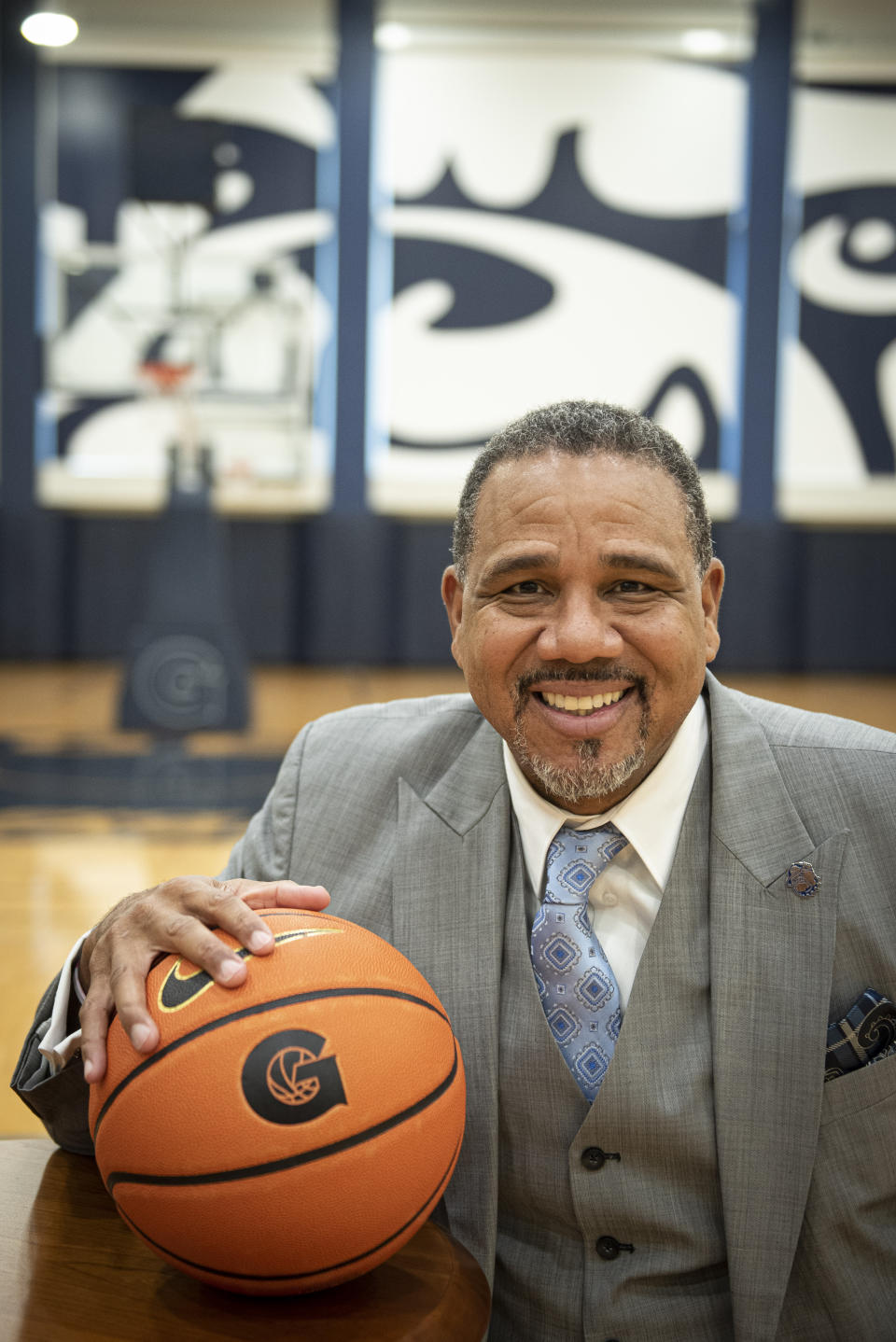 New Georgetown NCAA college basketball head coach Ed Cooley poses in Washington, Wednesday, March 22, 2023. (AP Photo/Cliff Owen)