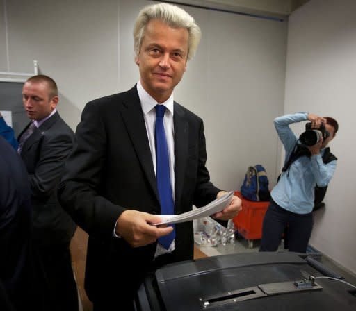 Dutch far-right Freedom Party leader Geert Wilders prepares to cast his vote on September 12, 2012 at a polling station in The Hague. The Netherlands voted in crunch polls Wednesday seen as a barometer of anti-European sentiment after a riveting campaign that has shaped into a tight race between two pro-Europe parties