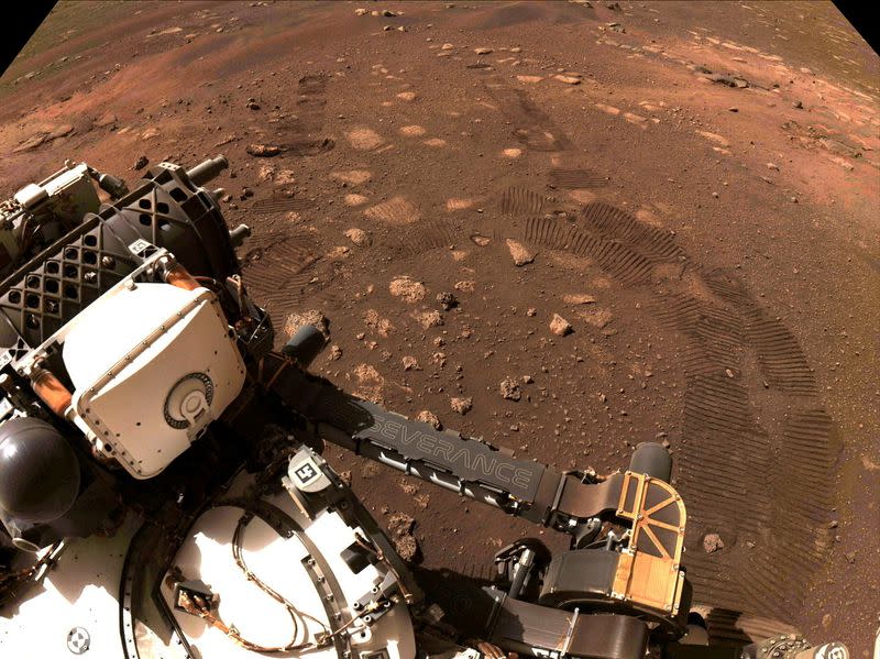 FILE PHOTO: NASA's Mars rover Perseverance takes its first, short drive on the surface of the red planet