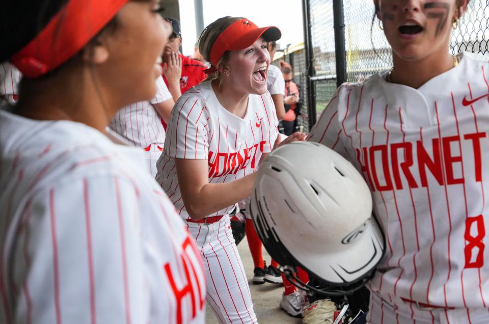 Beech Grove Hornets Harper Moore (0) yells in excitement with teammates on Wednesday, April 17, 2024, during the game at Beech Grove High School in Beech Grove.