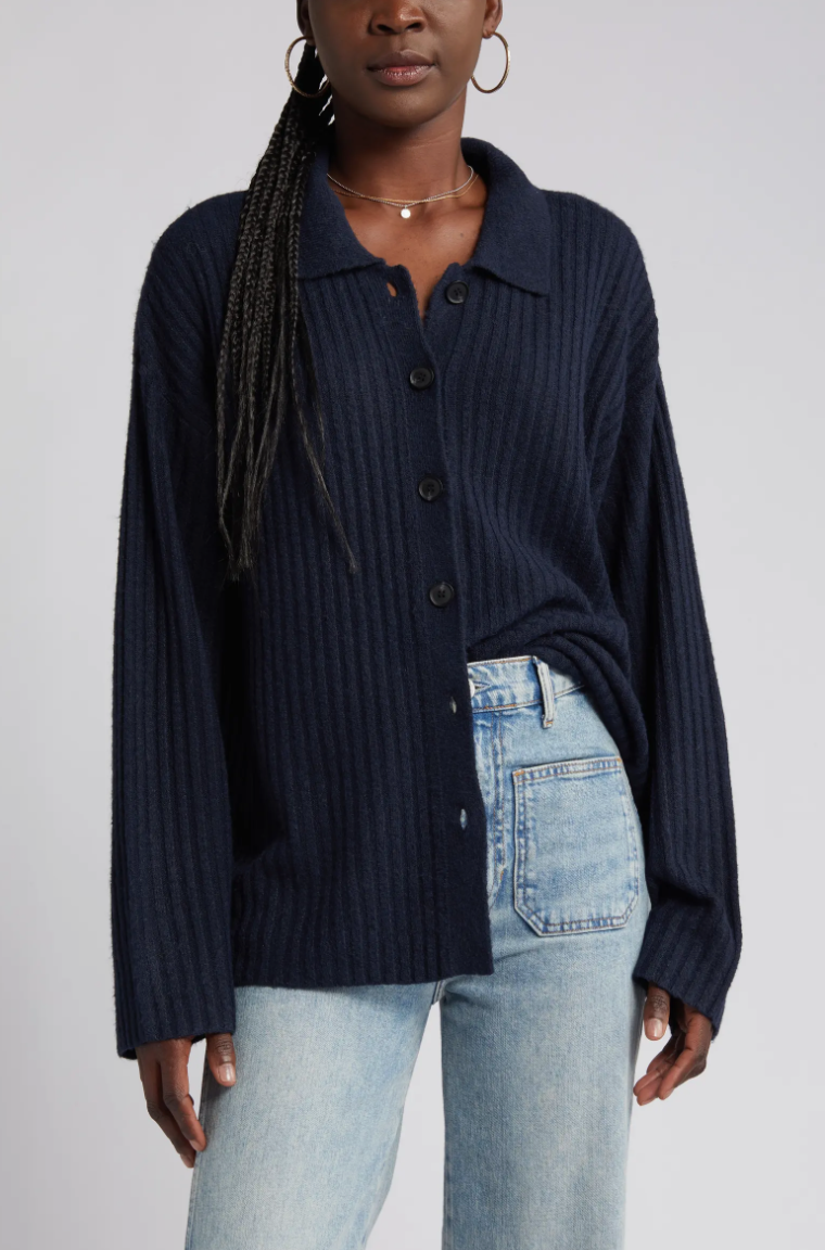 This deep navy blue pairs nicely with denim bottoms. Take cues from Nordstrom's model and try a light wash jean with the polo cardigan on top.