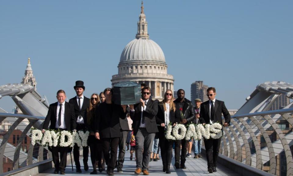 A funeral procession for payday loans near St Paul's Cathedral