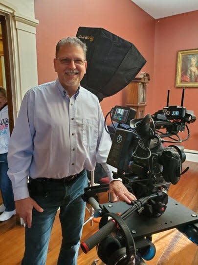 Len Brown of Canal Fulton is shown on the set of the PBS documentary "Engineering Tragedy: The Ashtabula Train Disaster." Len and his wife Patti Brown headed the project.