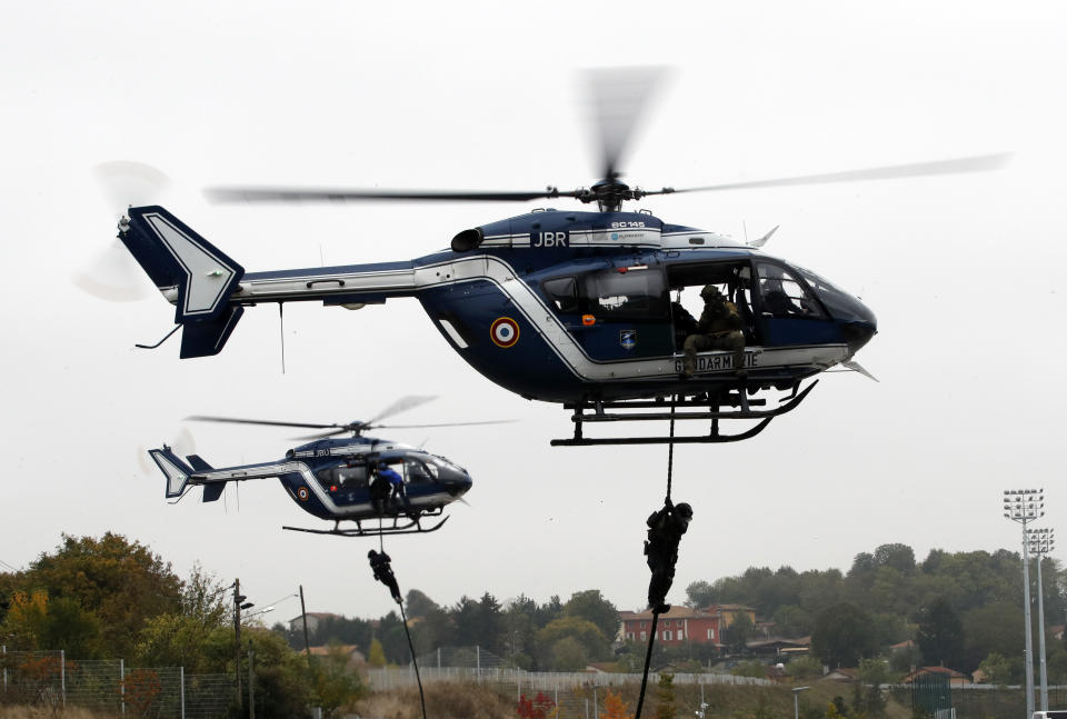 Members of the National Gendarmerie Intervention Group (GIGN) attend a training exercise in case of terrorist attack at the G6 Interior Ministers' meeting at the Groupama stadium in Decines, near Lyon, central France, Tuesday, Oct. 9, 2018. (AP Photo/Christophe Ena)