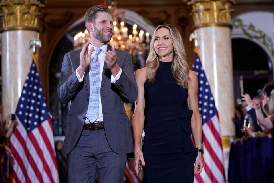 Eric and Lara Trump arrive before former his father’s speech (AP)