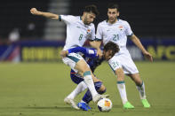 Iraq's Ali Basim Mohamed, left, and Japan's Riku Handa fight for the ball during a U-23 Asian Cup semi-final match between Iraq and Japan in Doha, Qatar, on Monday, April 29, 2024. (AP Photo/Hussein Sayed)