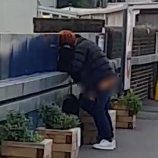 A couple has been caught appearing to have sex on a train platform. Photo: Twitter