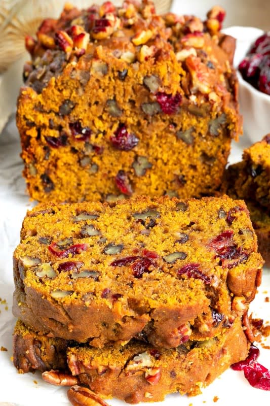 <p>Mom on Time Out</p><p>This extra delicious and supremely moist cranberry pecan pumpkin bread is bursting with fall flavors! </p><p><strong>Get the recipe: <em><a href="https://www.momontimeout.com/cranberry-pecan-pumpkin-bread-recipe/" rel="nofollow noopener" target="_blank" data-ylk="slk:Cranberry Pecan Pumpkin Bread;elm:context_link;itc:0;sec:content-canvas" class="link rapid-noclick-resp">Cranberry Pecan Pumpkin Bread</a></em></strong></p>