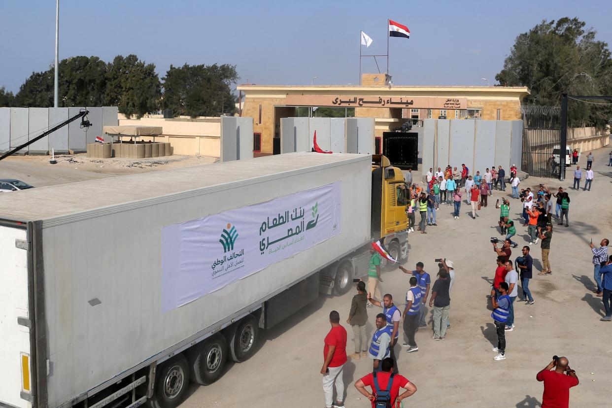 A convoy of aid lorries cross into Gaza from Egypt last Sunday (AFP via Getty Images)