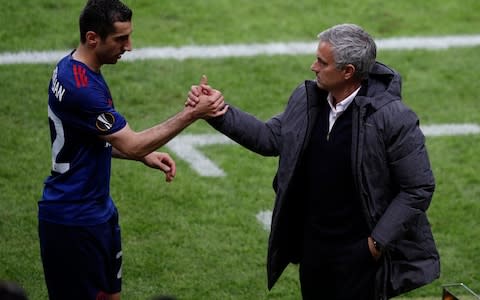 Jose Mourinho (right) with Henrikh Mkhitaryan - Credit: REUTERS
