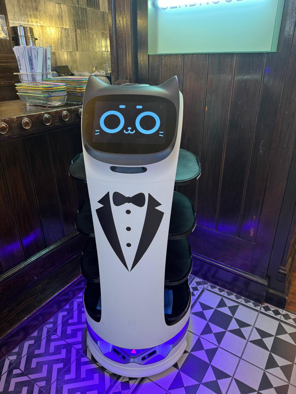 A pair of robots serves drinks and food at Tsaocha Bubble Tea House and Noodle Station 3, 506 State St.