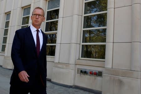 Mark Johnson, a British citizen who at the time of his arrest was HSBC's global head of foreign exchange cash trading, exits following a hearing at the U.S. Federal Court in Brooklyn, New York, U.S., August 29, 2016. REUTERS/Brendan McDermid