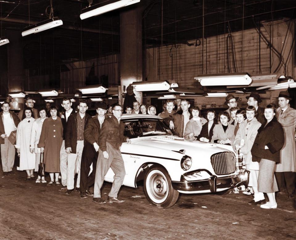 This picture from the 1950s features a group of local high school students who were part of Junior Achievement. Provincial Products, sponsored by Studebaker Corp., was the “company” these particular students were a part of from 1956-57, and in the photograph, they are posing next to a Studebaker Hawk that appears to be fresh off the assembly line.